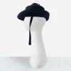 Profile of sculptural tiered dome crown on 1960s Breton hat.