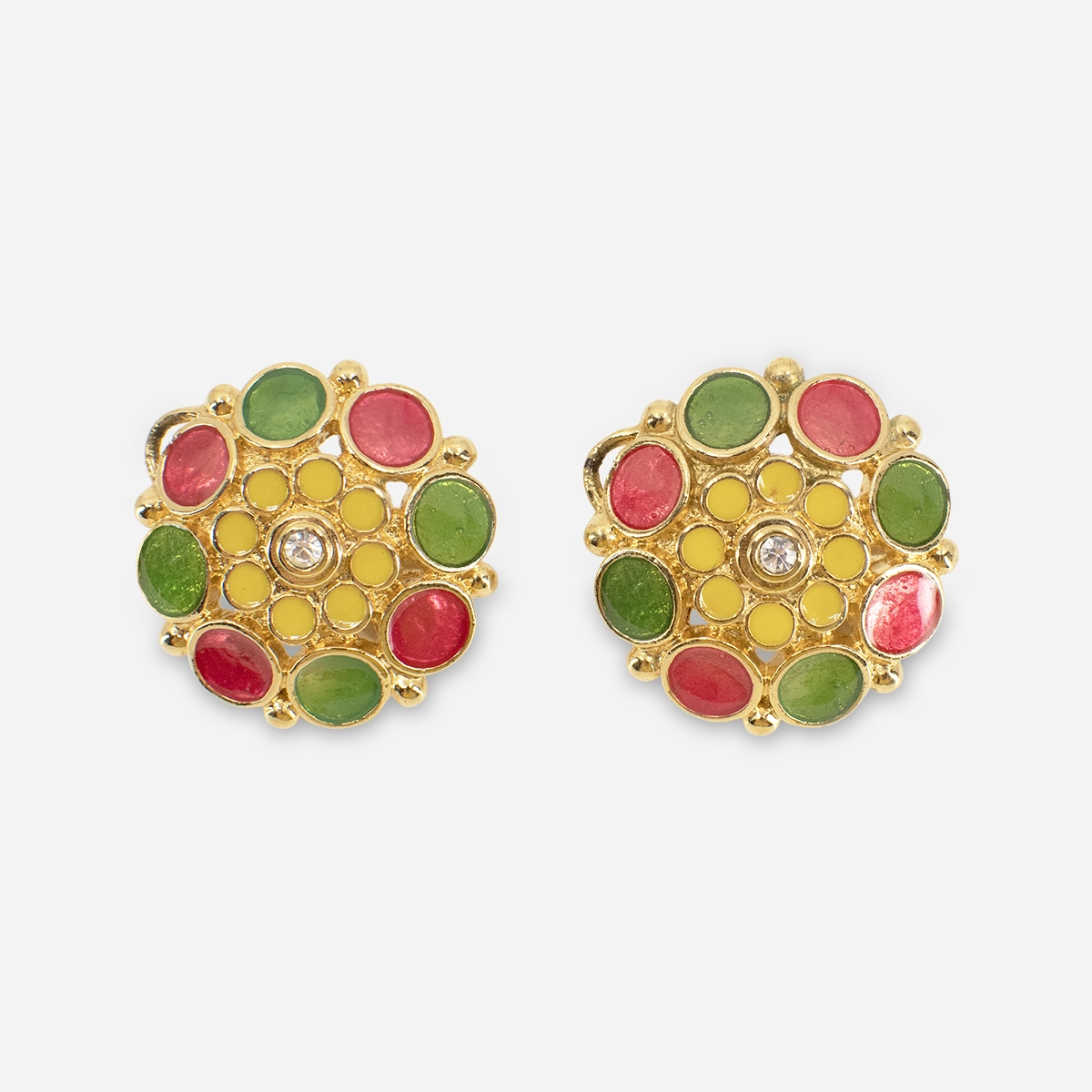 Vintage Barrera for Avon enamel earrings Close view of vintage Avon enamel floral clip earrings with colorful enamel petals and crystal center.