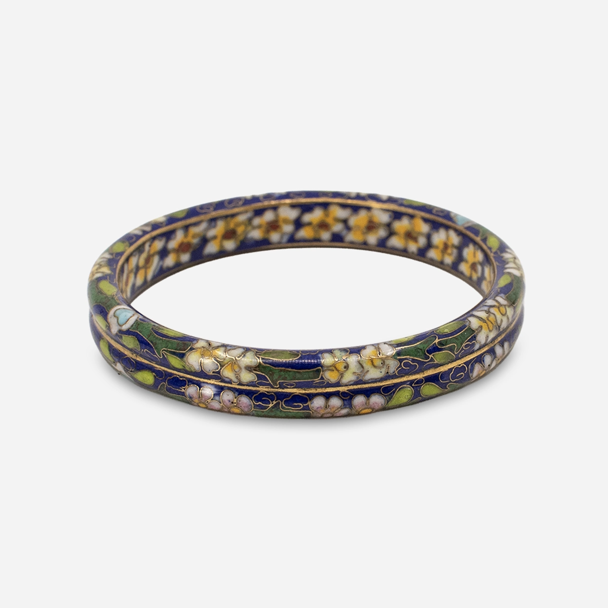 vintage blue Cloisonne bracelet Vintage cloisonné bangle angled view blue green floral pattern