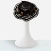 1900s Victorian hat rear view of Edwardian picture hat showing wide brim and floral accents.