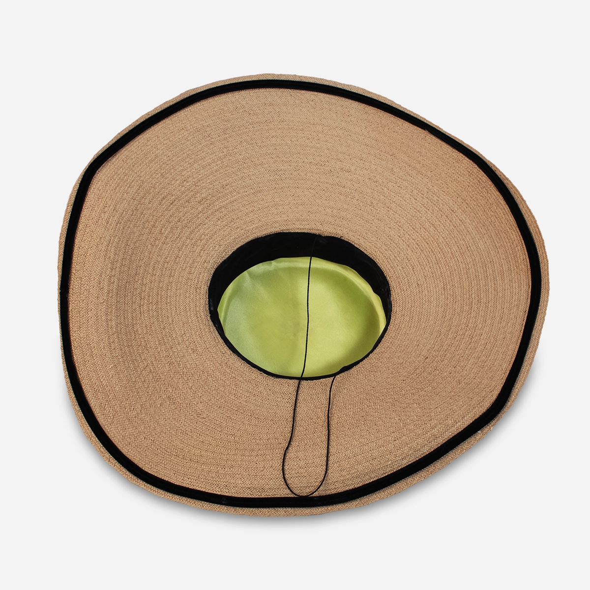 Vintage straw cartwheel hat with black velvet crown and wide brim on mannequin