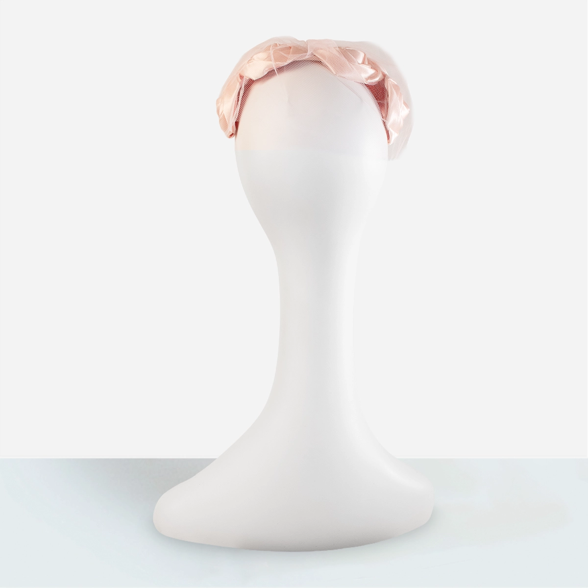 Vintage pink floral half hat rear view on mannequin