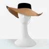 1950s straw cartwheel hat Vintage straw cartwheel hat with black velvet crown and wide brim on mannequin