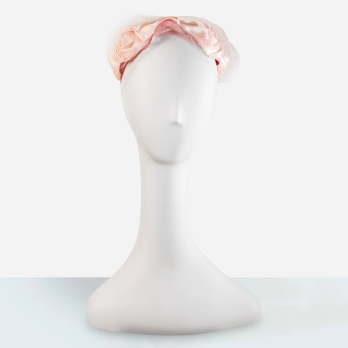 Vintage pink floral half hat front view on mannequin