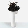 black derby tilt hat with pheasant feathers side profile