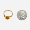 14K gold ring with amber glass stone and sculptural modernist setting.