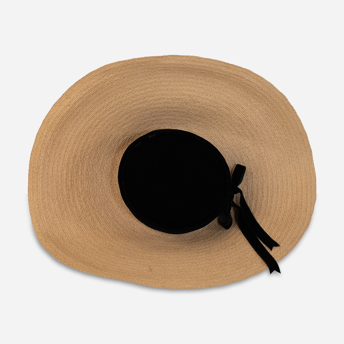 Top view of vintage straw cartwheel hat showing full 19 inch wide brim