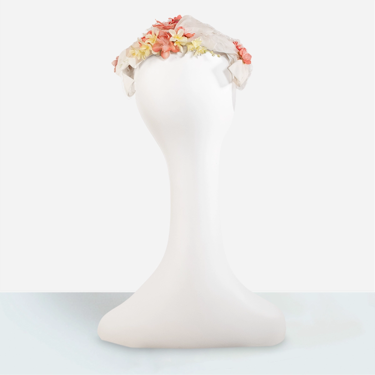 Back angle vintage white floral half hat with openwork frame