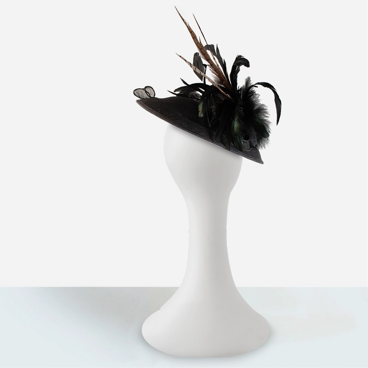 black sinamay tilt hat back view feather detail