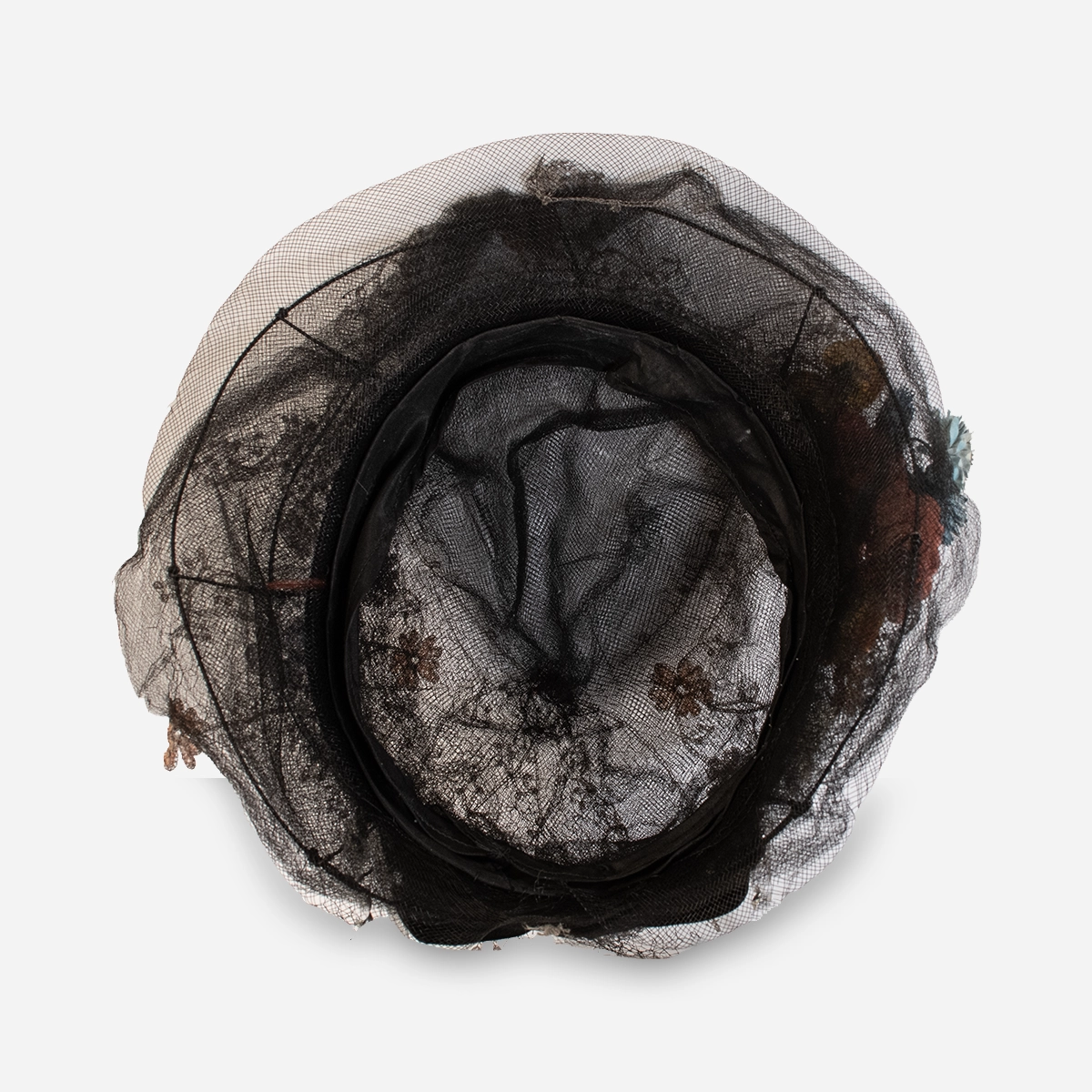 inside view Edwardian black horsehair floral hat showing close fitting transitional silhouette.