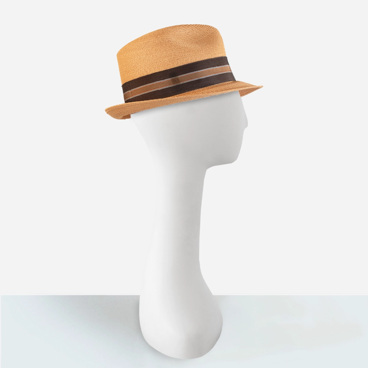 1950s mens straw trilby side view Vintage men’s summer trilby hat by Churchill on mannequin head.