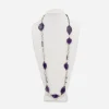 Vintage long purple glass necklace featuring irregular faceted beads and silver-tone openwork links.