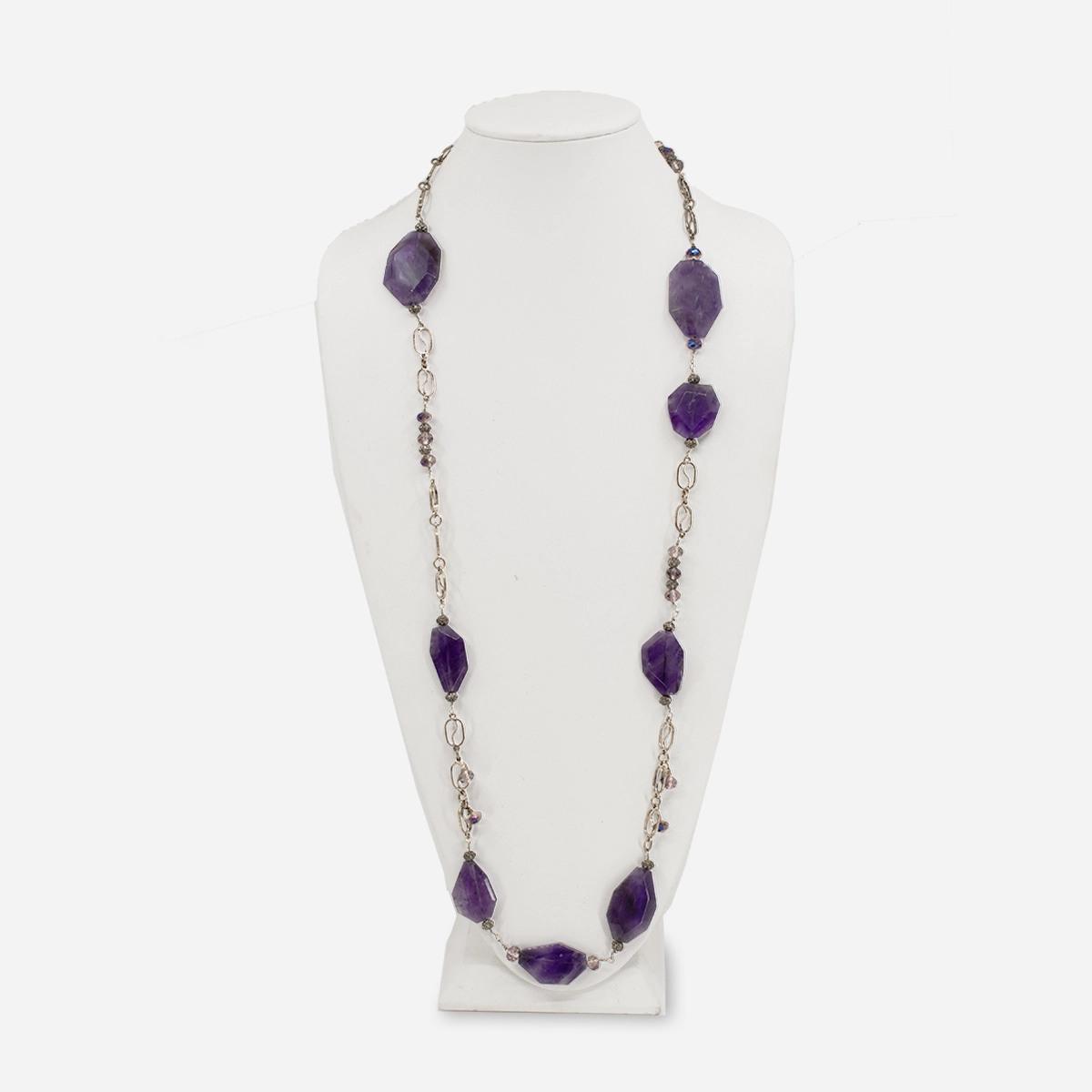 Vintage long purple glass necklace featuring irregular faceted beads and silver-tone openwork links.