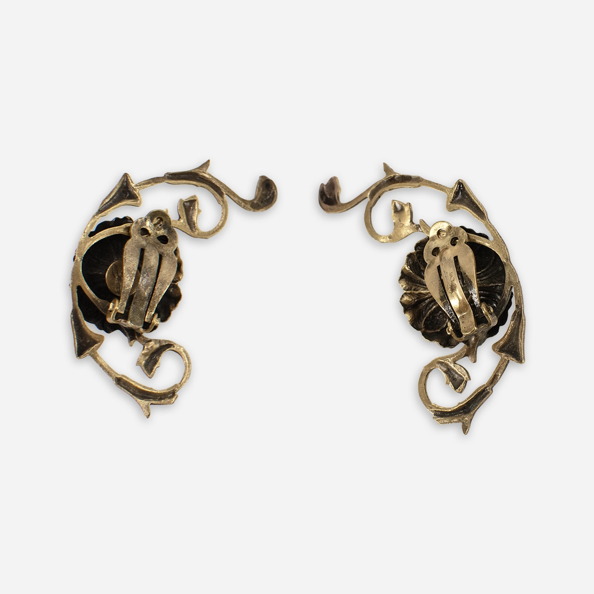 clip earrings backs 1950s Joseff purple clip earrings with Art Nouveau inspired botanical design.