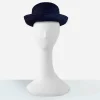 Vintage 1960s navy blue straw roller hat with compact close silhouette