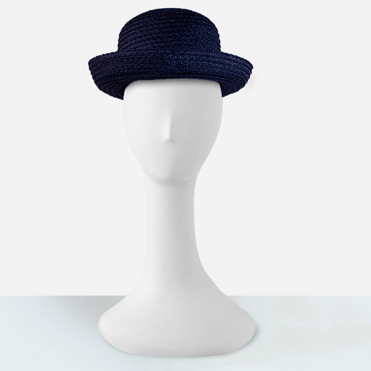 Vintage 1960s navy blue straw roller hat with compact close silhouette