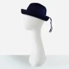 1960s navy blue straw roller hat with trailing grosgrain ribbon detail side view