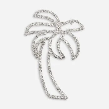 Vintage silver-tone rhinestone palm tree brooch with openwork fronds and clear crystal sparkle on white background.