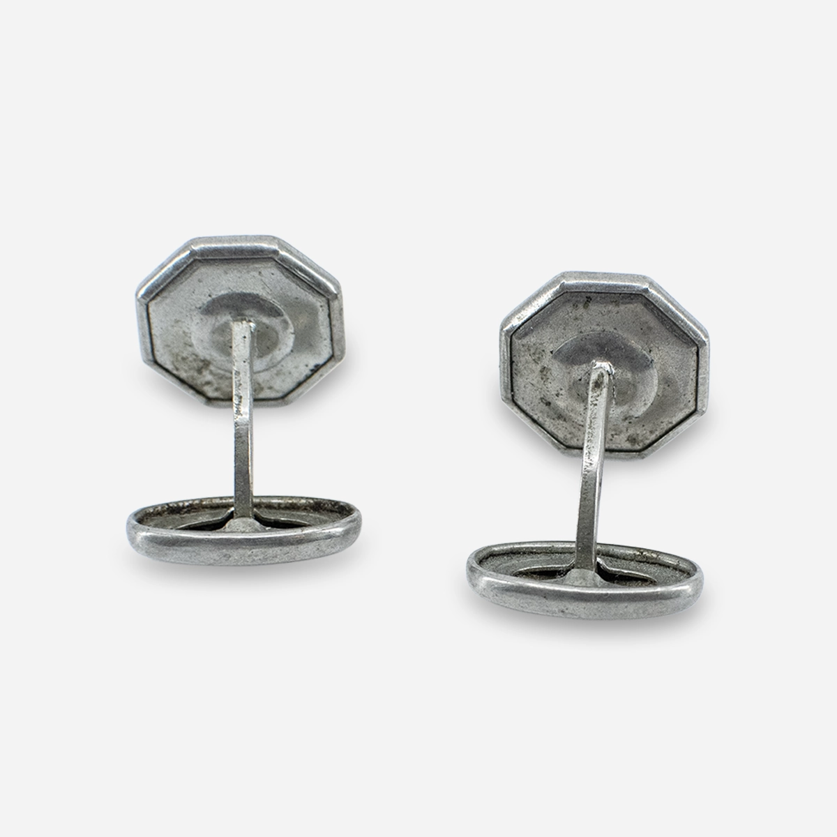 Rear view of 1930s Art Deco cufflinks showing patina and fixed posts.
