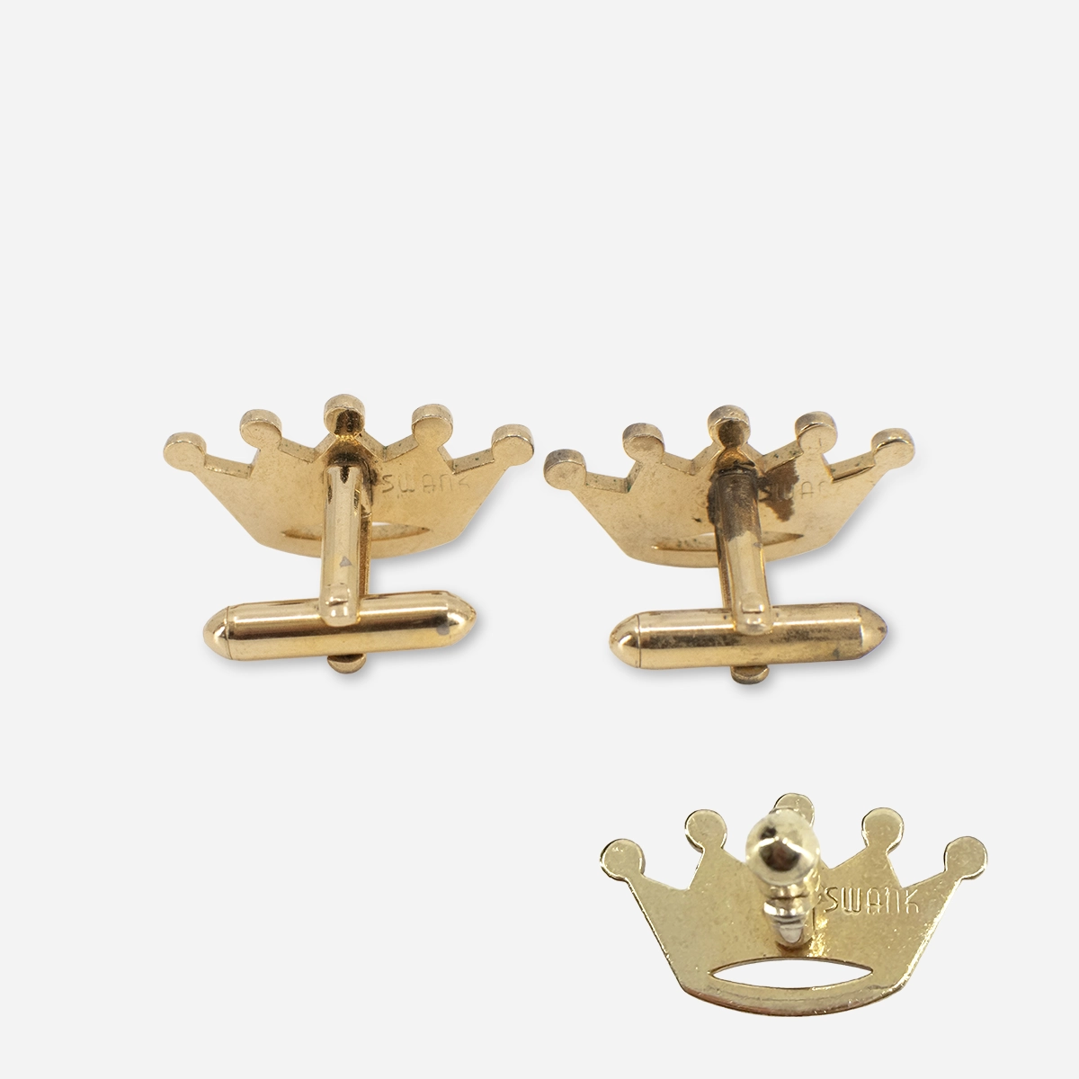 Signed swank bullet closure cufflinks Signed Swank gold crown cufflinks showing bullet toggle backs and reverse side.
