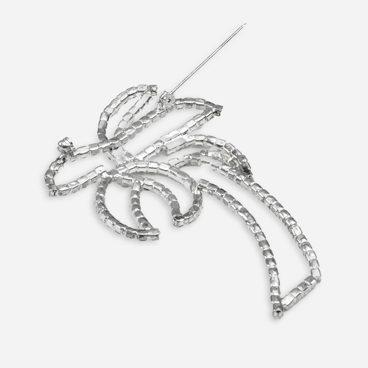 Silvertone rhinestone palm tree brooch Back of vintage silver-tone rhinestone palm tree brooch showing cup chain-style construction and pin back closure.
