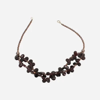 Vintage garnet bead necklace with double-strand cluster design and silver-tone clasp.