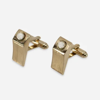 Vintage 1950s goldtone pearl cufflinks with brushed wedge faces and bullet-and-toggle backs.