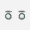 1930s Art Deco cufflinks with green enamel and mother-of-pearl centers.