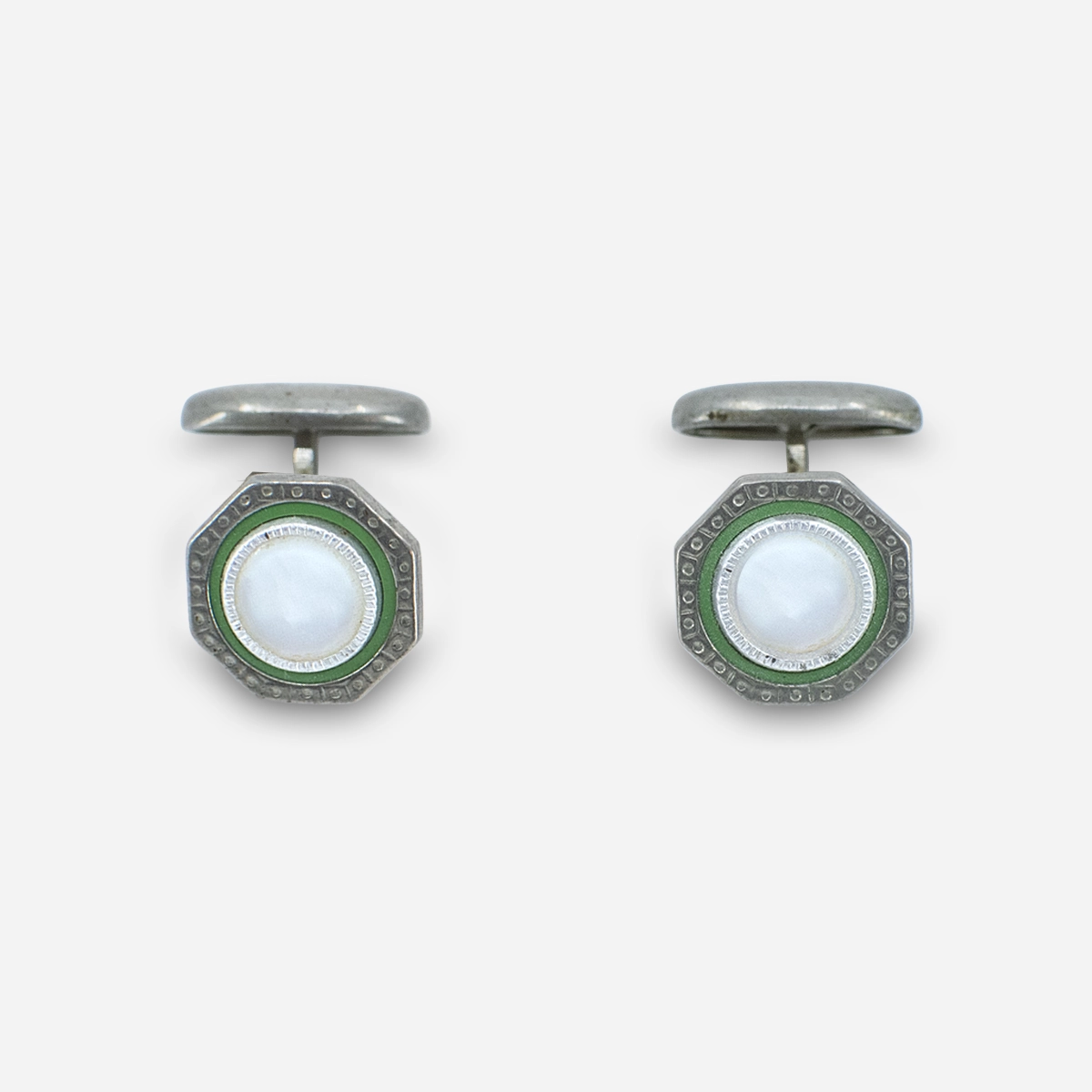 1930s Art Deco cufflinks with green enamel and mother-of-pearl centers.