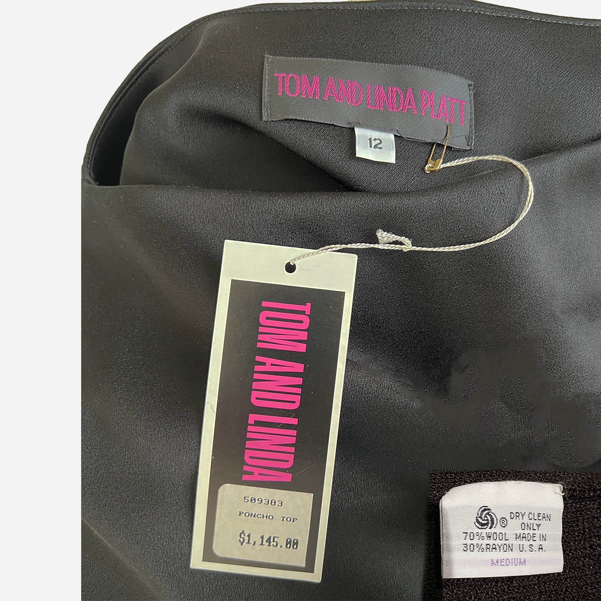 Tom and Linda Platt size 12 label and original $1,145 poncho top tag