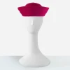 Vintage Fuchsia pink breton hat Straight-on view of the fuchsia pink Breton hat showing the high rolled brim and rounded crown.
