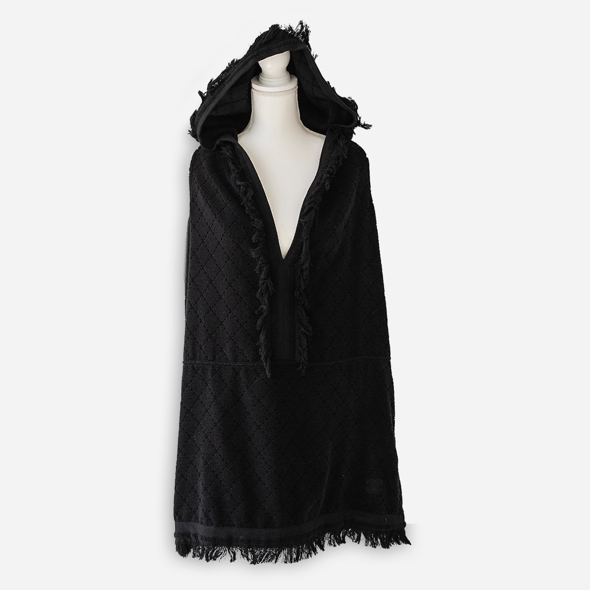 black terry swimsuit cover with hood Chanel black cotton pile swimsuit cover-up shown on mannequin with fringed hood and deep V neckline.