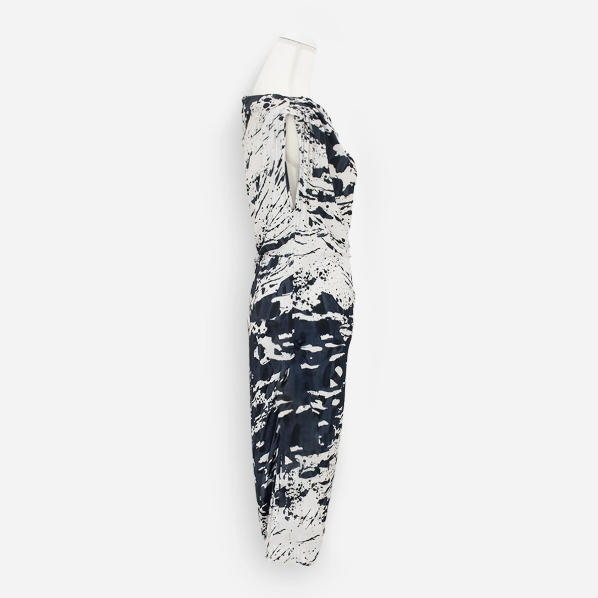 Side view of the navy-and-white Escada jersey dress showing its draped neckline and gathered skirt.