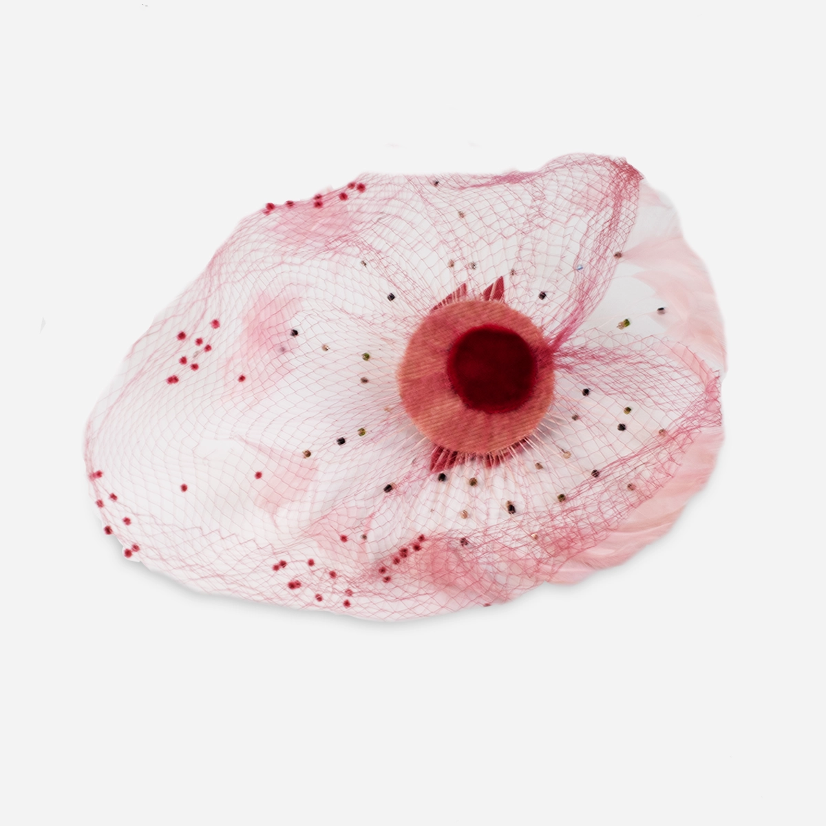 inside of whimsy hat Interior view of the pink net whimsy hat showing its petite circular crown