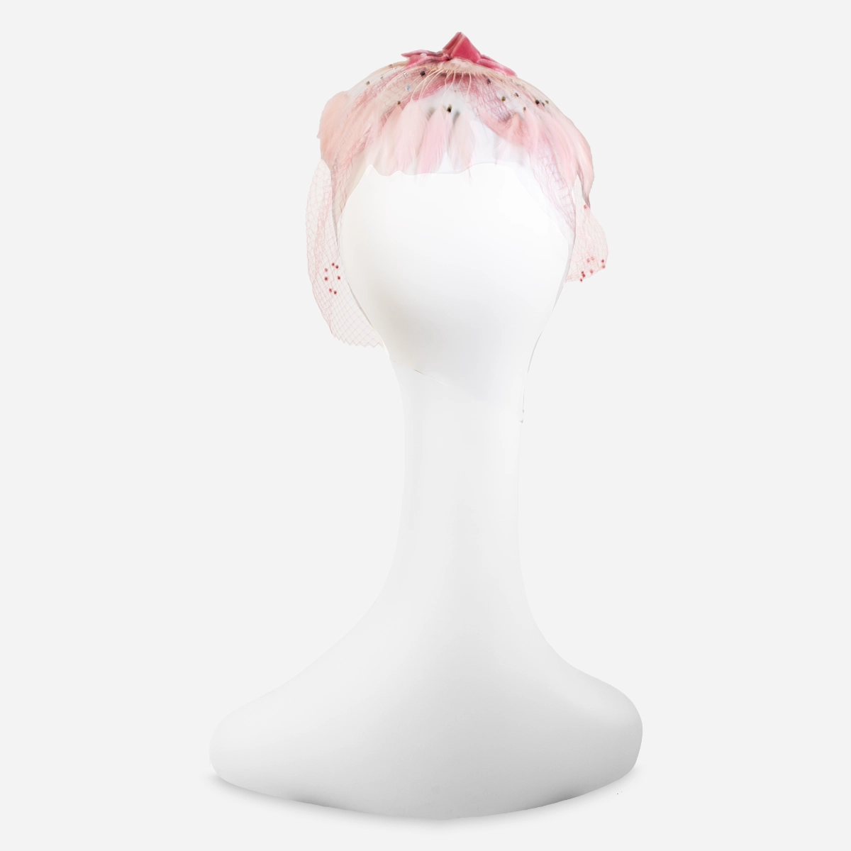 pink feather whimsey hat Back view of pink feather whimsy hat showing the veil’s length and coverage