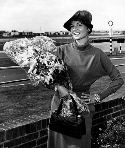 Eva Bartok wearing a bucket hat